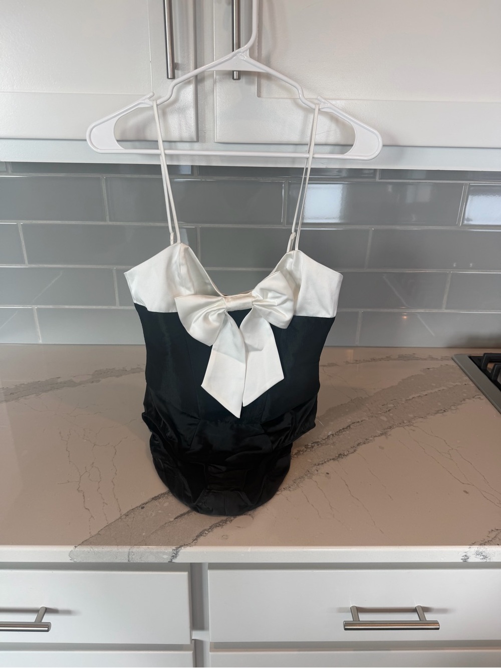 Women’s Black & White Bow One-Piece Bodysuit